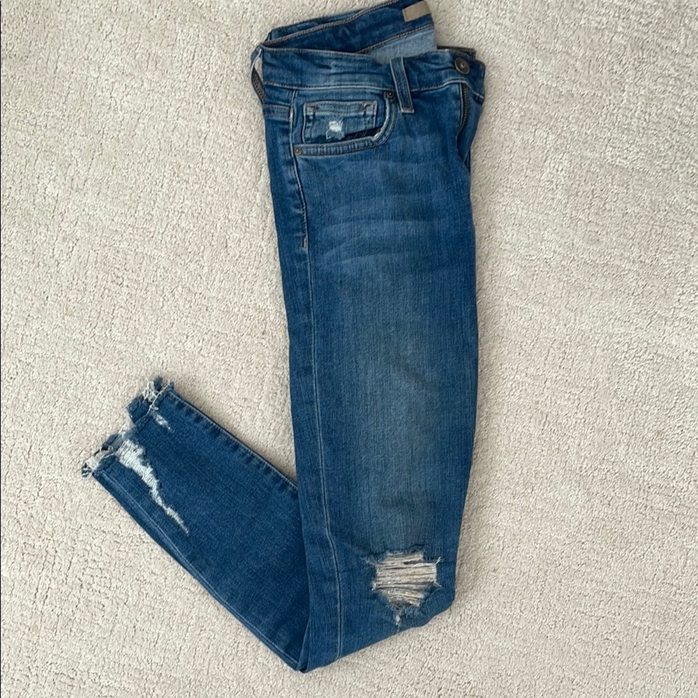 Women's Distressed Blue Jeans